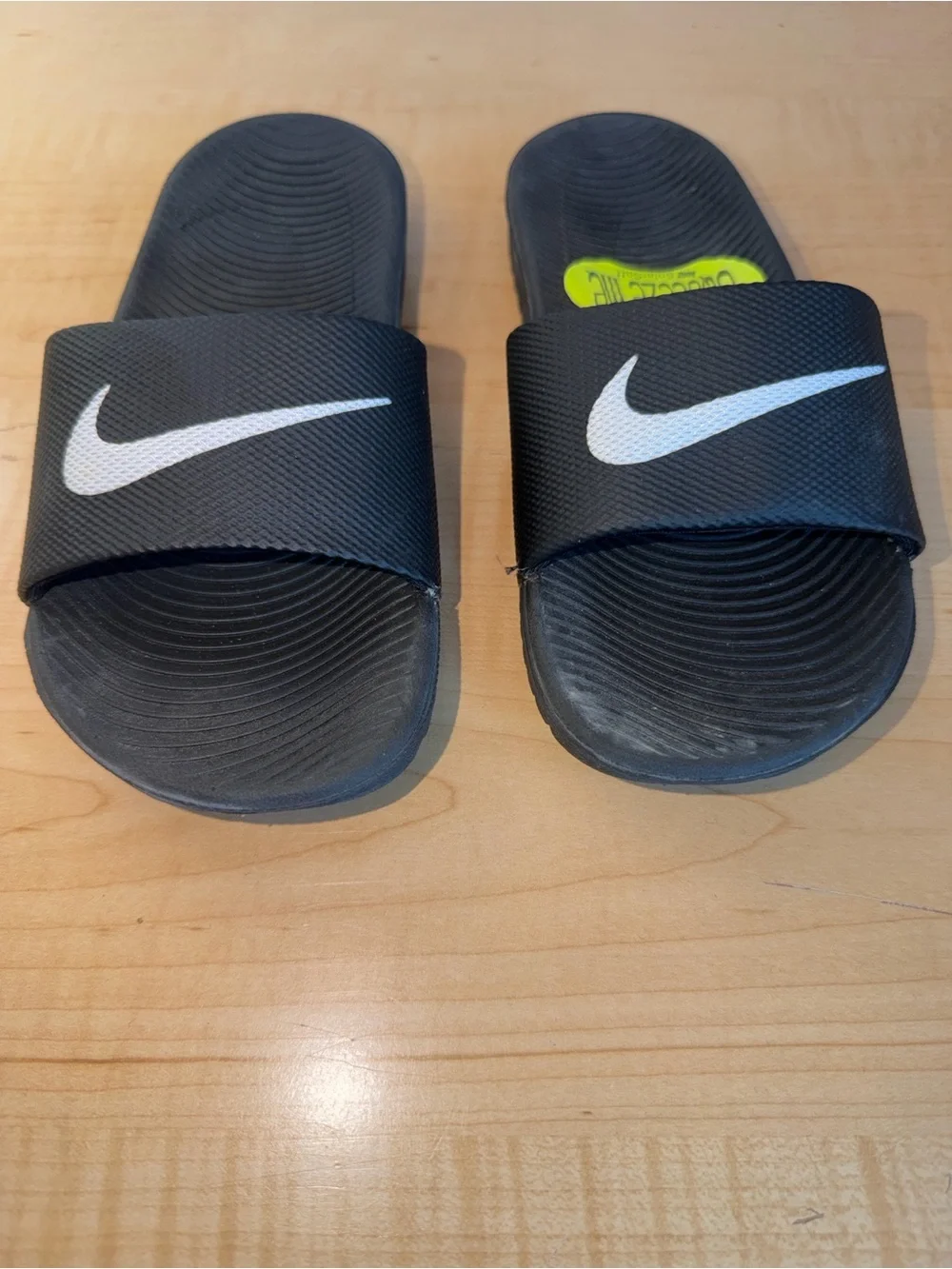 Youth Nike Black Slides with White Swoosh